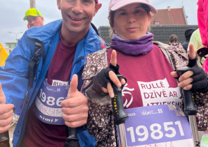 Rimi Rīgas maratona dalībnieki - iedzīvotāji vīrietis un sieviete