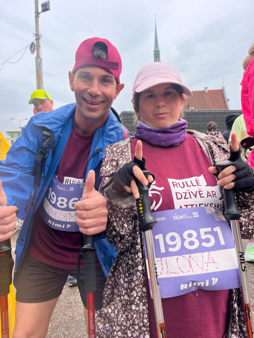 Rimi Rīgas maratona dalībnieki - iedzīvotāji vīrietis un sieviete
